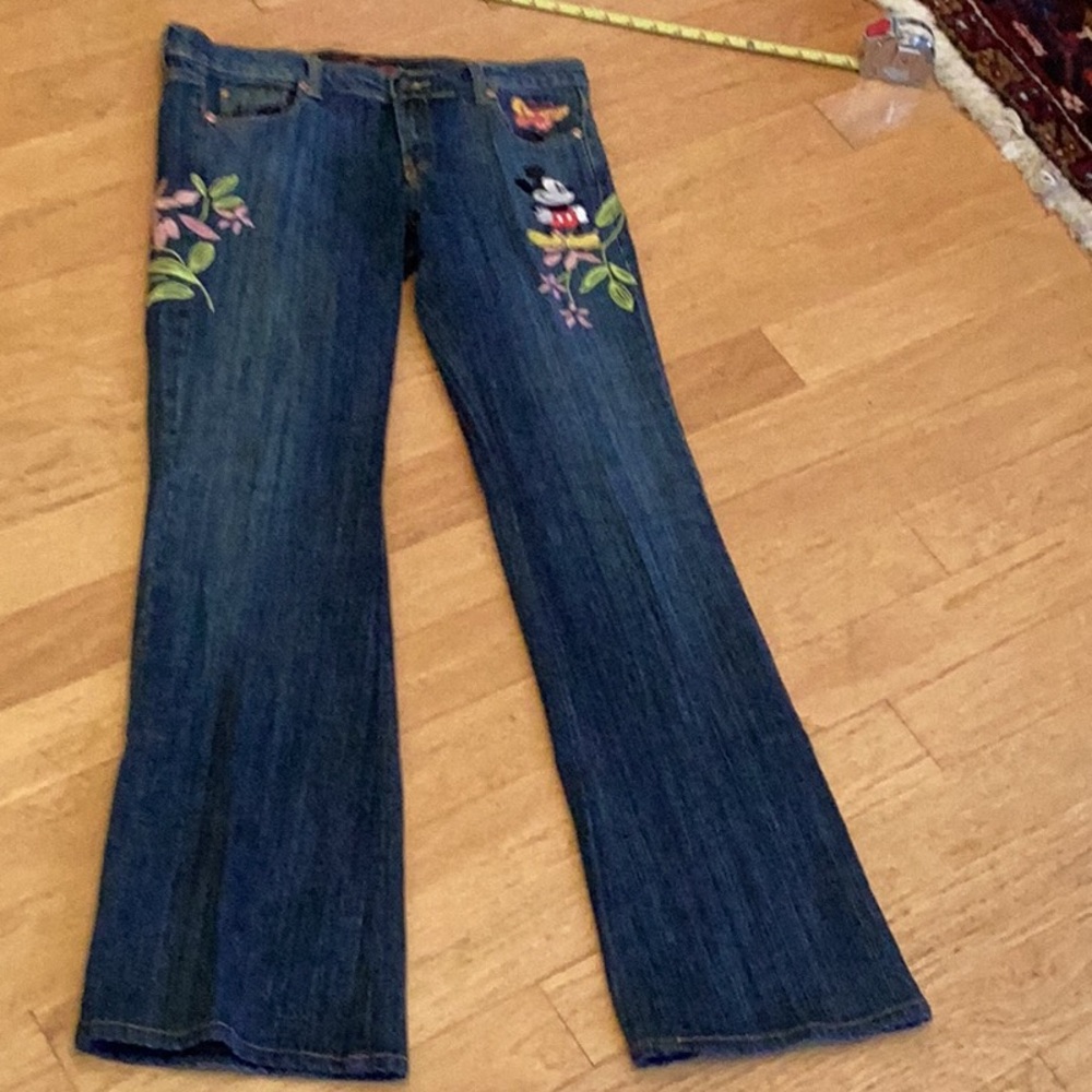 Delightful Disney low cut wide leg dark wash jeans with cool Mickey embr…
